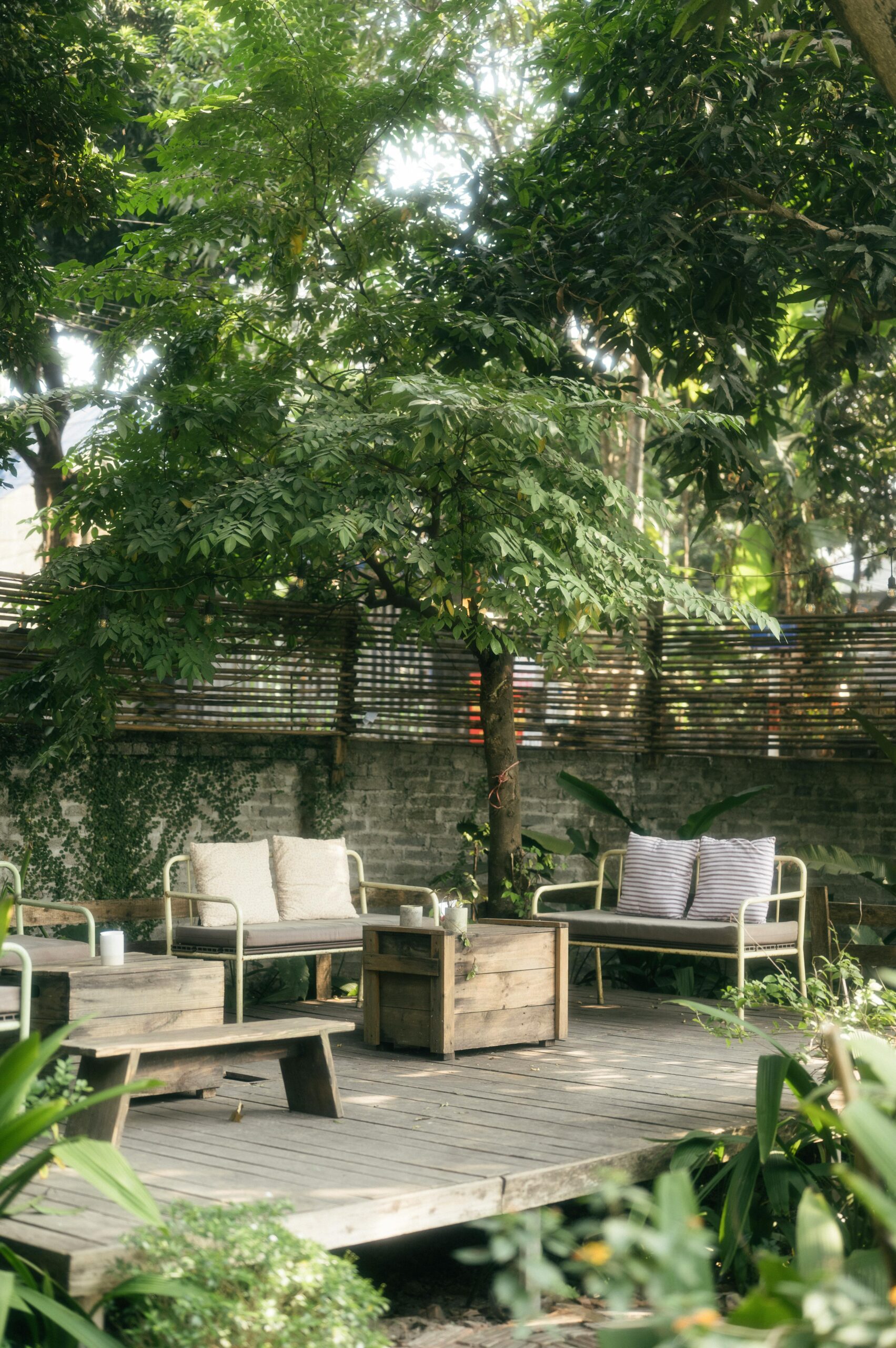 A tranquil outdoor patio setup in a lush garden in Lạng Sơn, Vietnam.